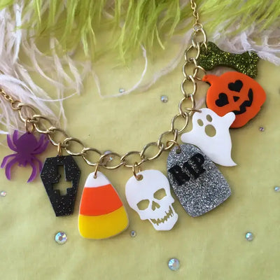 Halloween Accent Charm - Necklace featuring spooky acrylic charms including a skull, pumpkin, and spider.