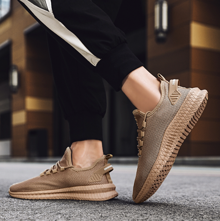 Running Shoes Sneakers Casual Men's Outdoor Athletic Jogging Sports in a stylish urban setting.