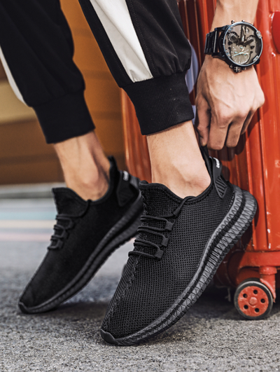 Men's Outdoor Athletic Jogging Sports Running Shoes Sneakers Casual, black mesh sneakers with stylish design.