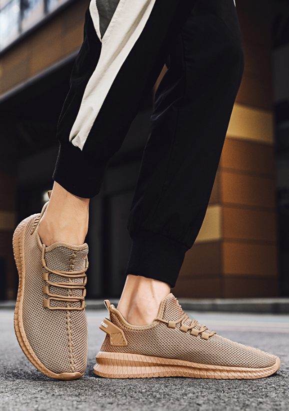 Running Shoes Sneakers Casual Men's Outdoor Athletic Jogging Sports worn on urban street by active male model.