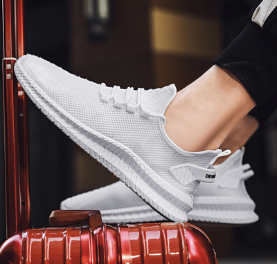 Running Shoes Sneakers Casual Men's Outdoor Athletic Jogging Sports in white with modern design.