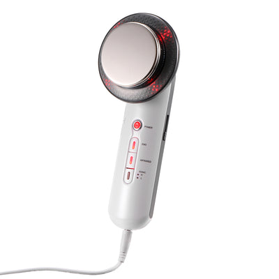 A handheld white body slimming massager featuring a large round metal head with red LED lights, designed for infrared and EMS therapy.