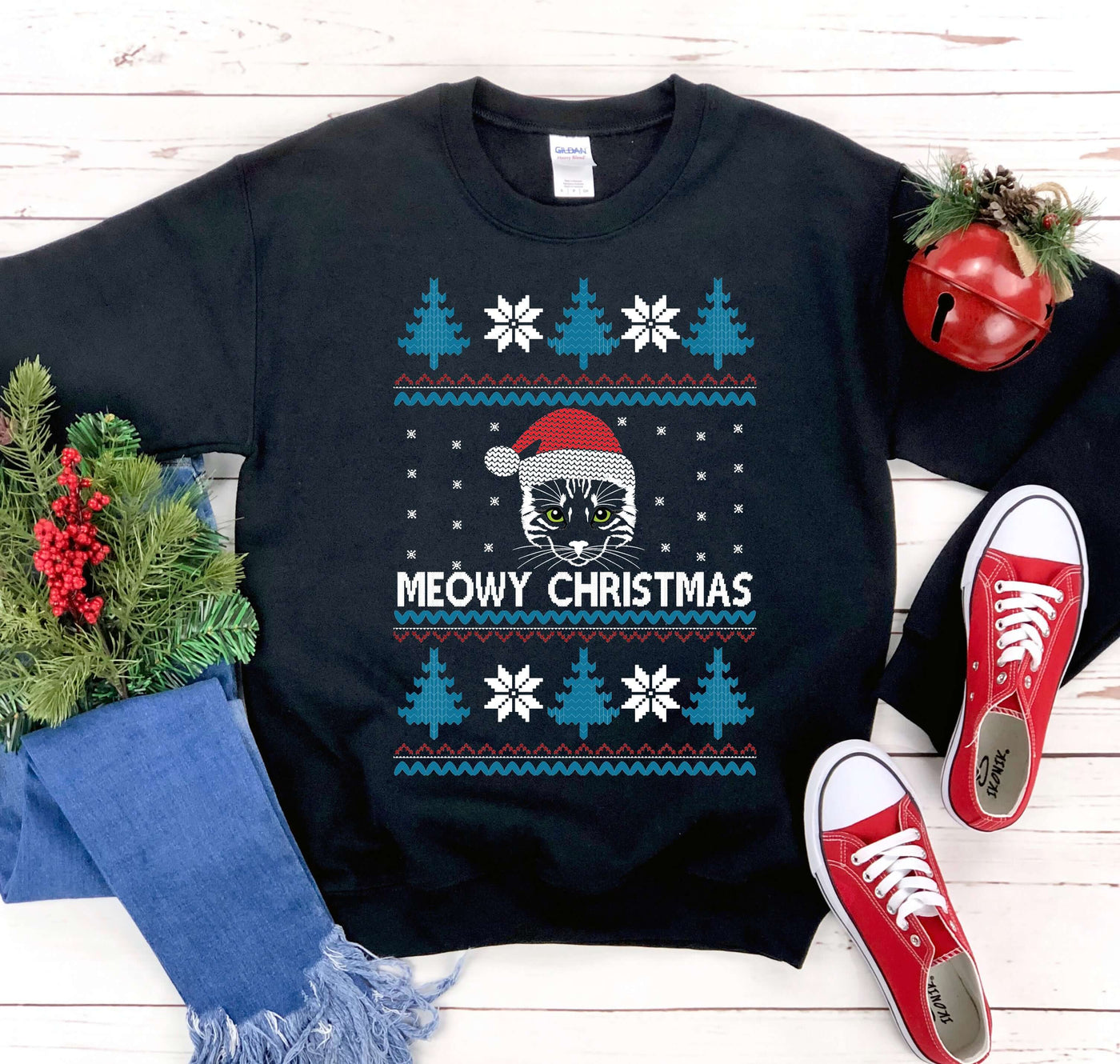Meowy Christmas Sweatshirt featuring a cat in a Santa hat with a festive design, perfect for holiday celebrations.