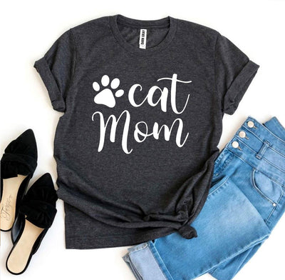 Cat Mom T-shirt displayed with paw print design, paired with jeans and stylish black flats.