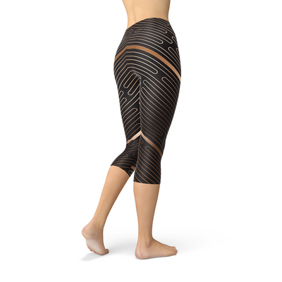 Womens Striped Lines Sports Brown Capri Leggings showcasing a detailed graphic design on model.