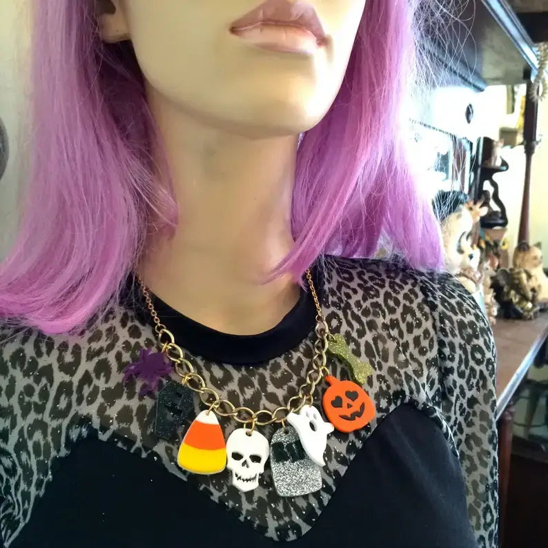 Halloween Accent Charm - Necklace with colorful charms like skull, ghost, and pumpkin, perfect for Halloween outfits.