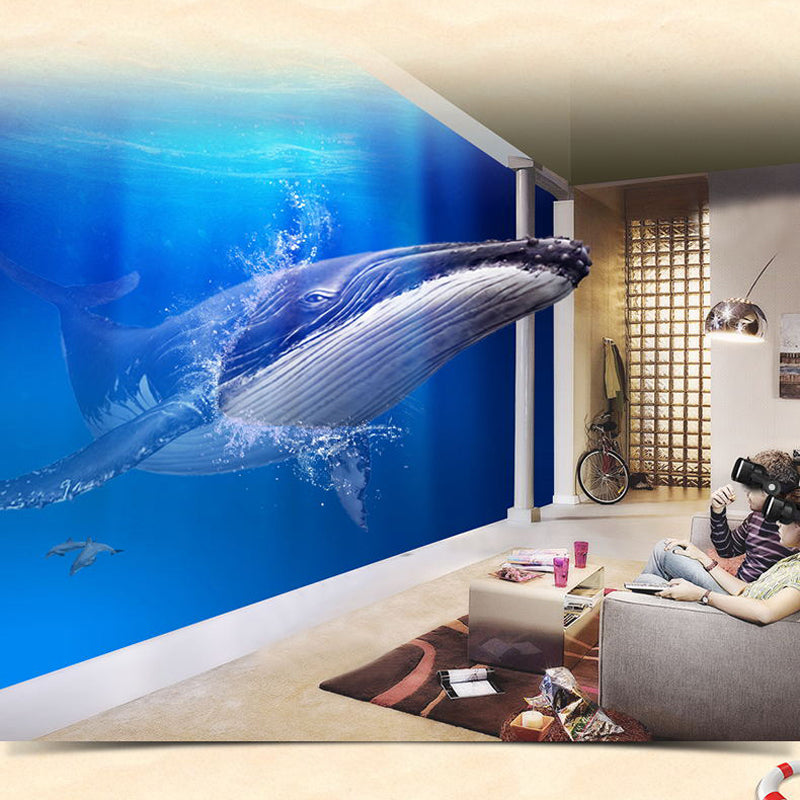 User experiencing virtual reality with Dragon Flash VR Gaming Headset With Controller while whale swims nearby.